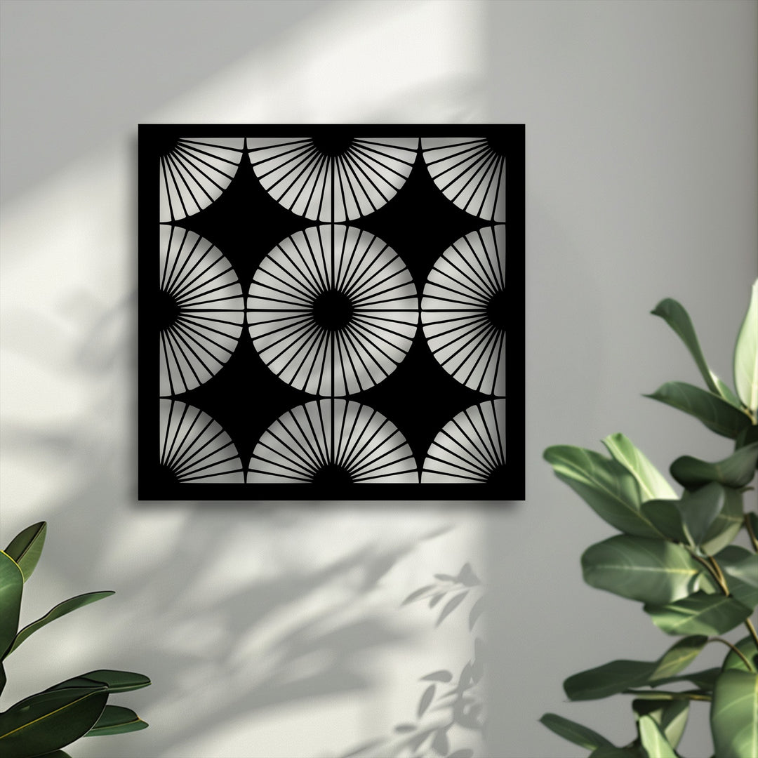 The cool color temperature accentuates the intricate radiant fan pattern geometric symmetry of this decorative metal art.