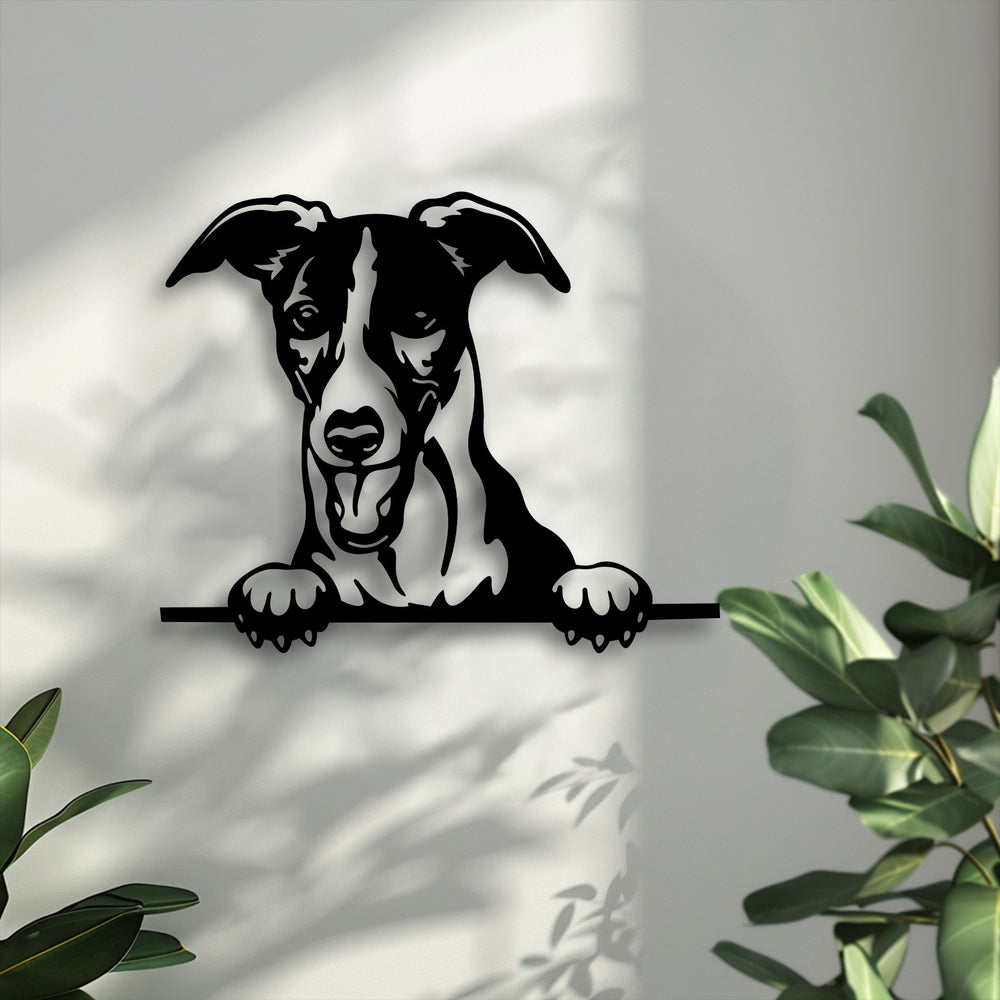 A light grey background showcases a black metal curious puppy peeking decoration wall art, casting striking shadows.