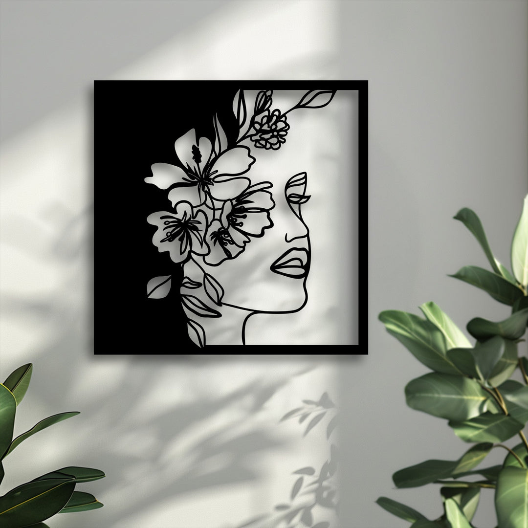 The negative space of the elegant black metal floral woman line art forms a striking contrast, perfect as modern decoration wall art.