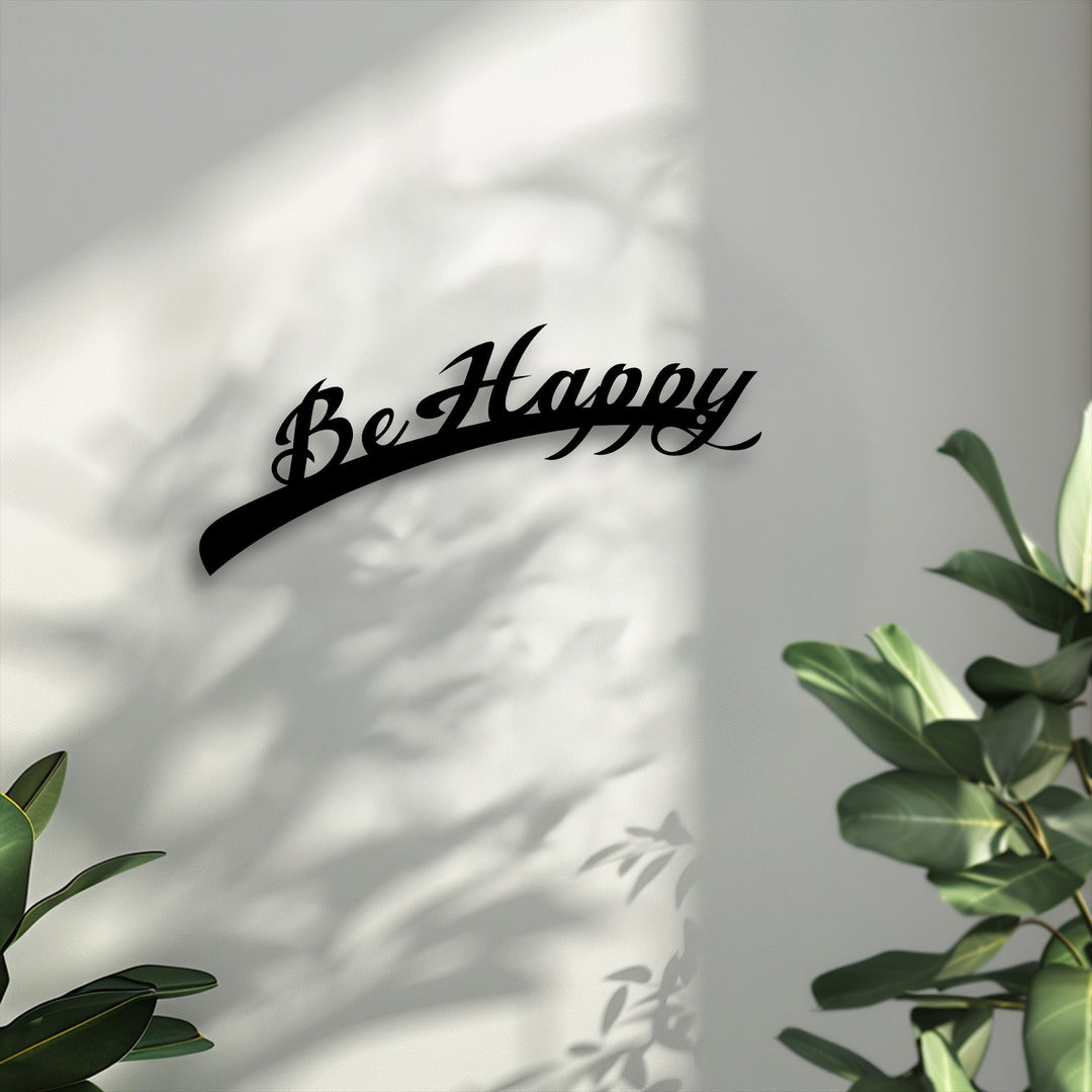 The image showcases a neutral to slightly cool color temperature, with bright, diffused light highlighting the elegant 'Be Happy' unique metal wall art.