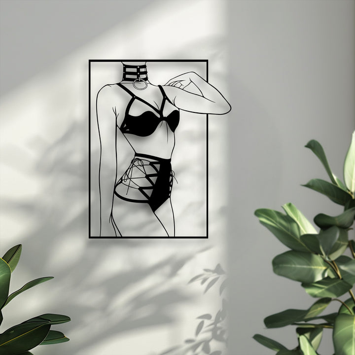 Subtle off-white dominates the background of this minimalist female silhouette metal wall art, a modern line art decoration piece.