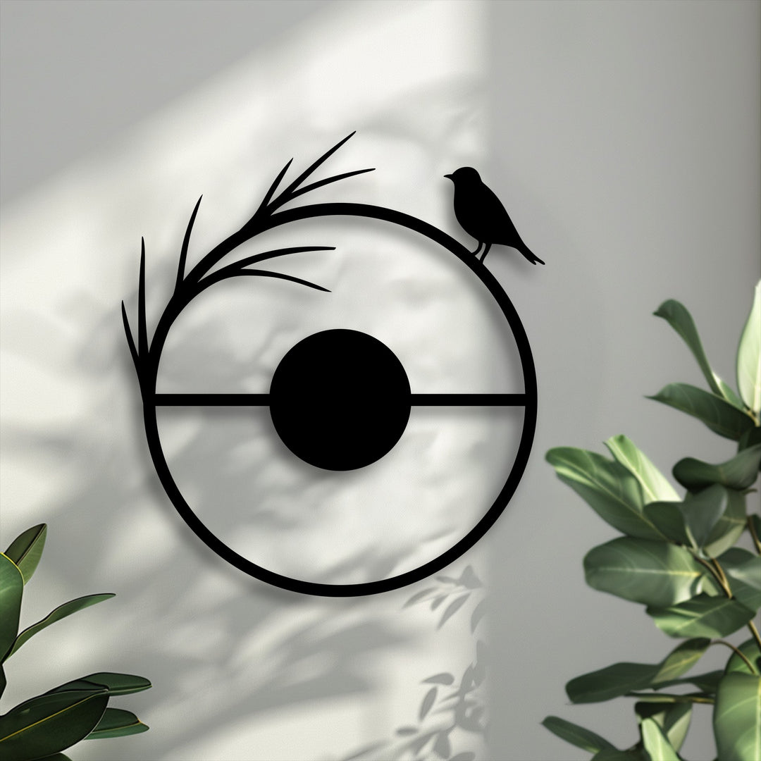 The stillness of a lone bird perched on a minimalist circular decorative metal art piece, casting serene shadows amidst lush green plants.