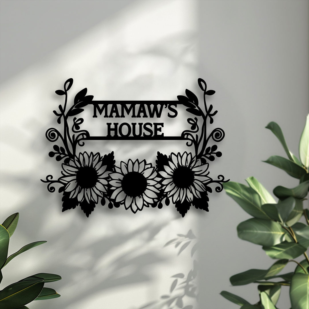 Demonstrating remarkable depth, this personalized sunflower family name metal artwork features a layered black silhouette home sign casting subtle shadows.