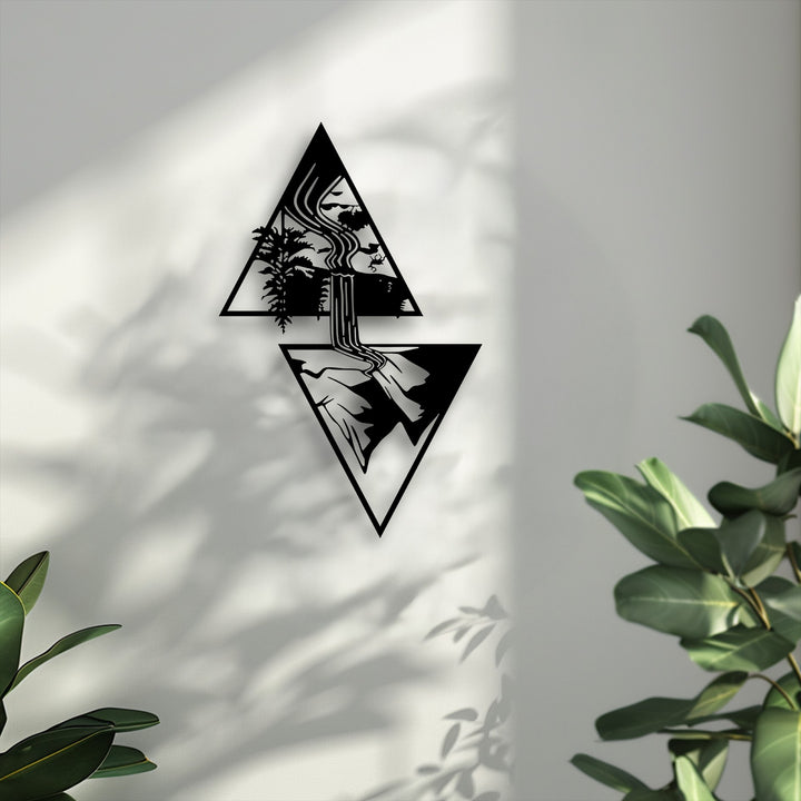 Two distinct geometric triangles shape this decorative metal art, portraying a serene waterfall cascading through a lush nature landscape.