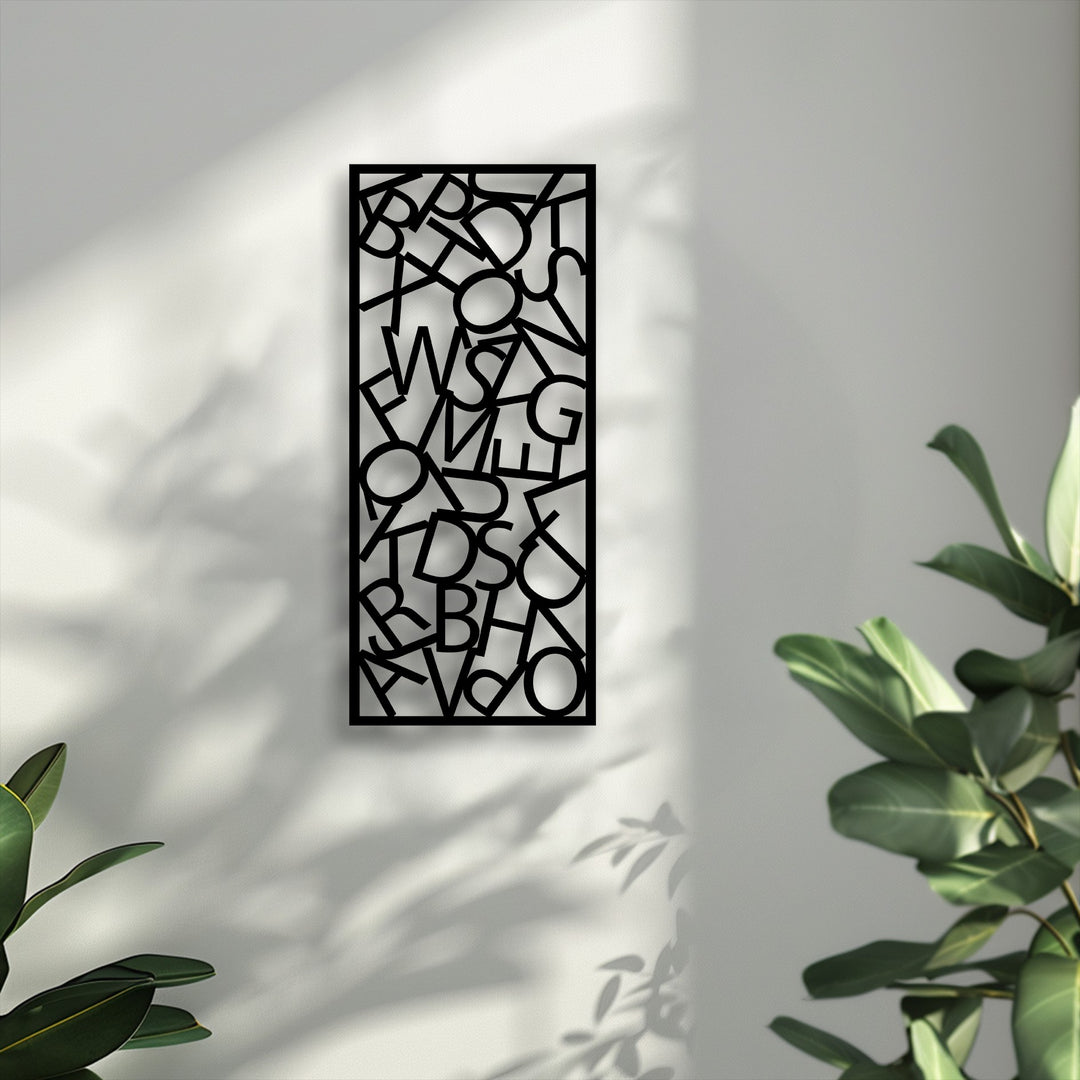 The crisp, cool color temperature enhances the detailed abstract typography metal artwork, showcasing its scattered letter composition on a sunlit wall.