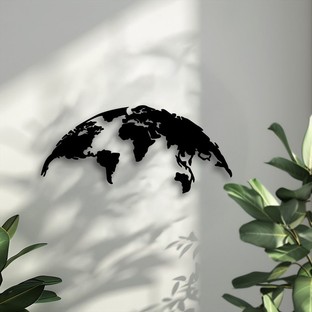 The striking color contrast between the dark silhouette of the world map metal decoration wall art and the pale, sun-drenched background creates depth.