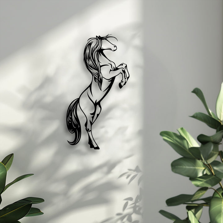 The crisp, distinct edges of the rearing horse metal decoration wall art form a bold silhouette, enhanced by the deep, dimensional shadows it casts.