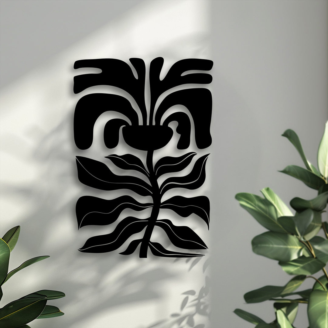 The elegant negative space around the abstract floral face metal decoration wall art creates dynamic shadows, enhancing the modern botanical line decor.