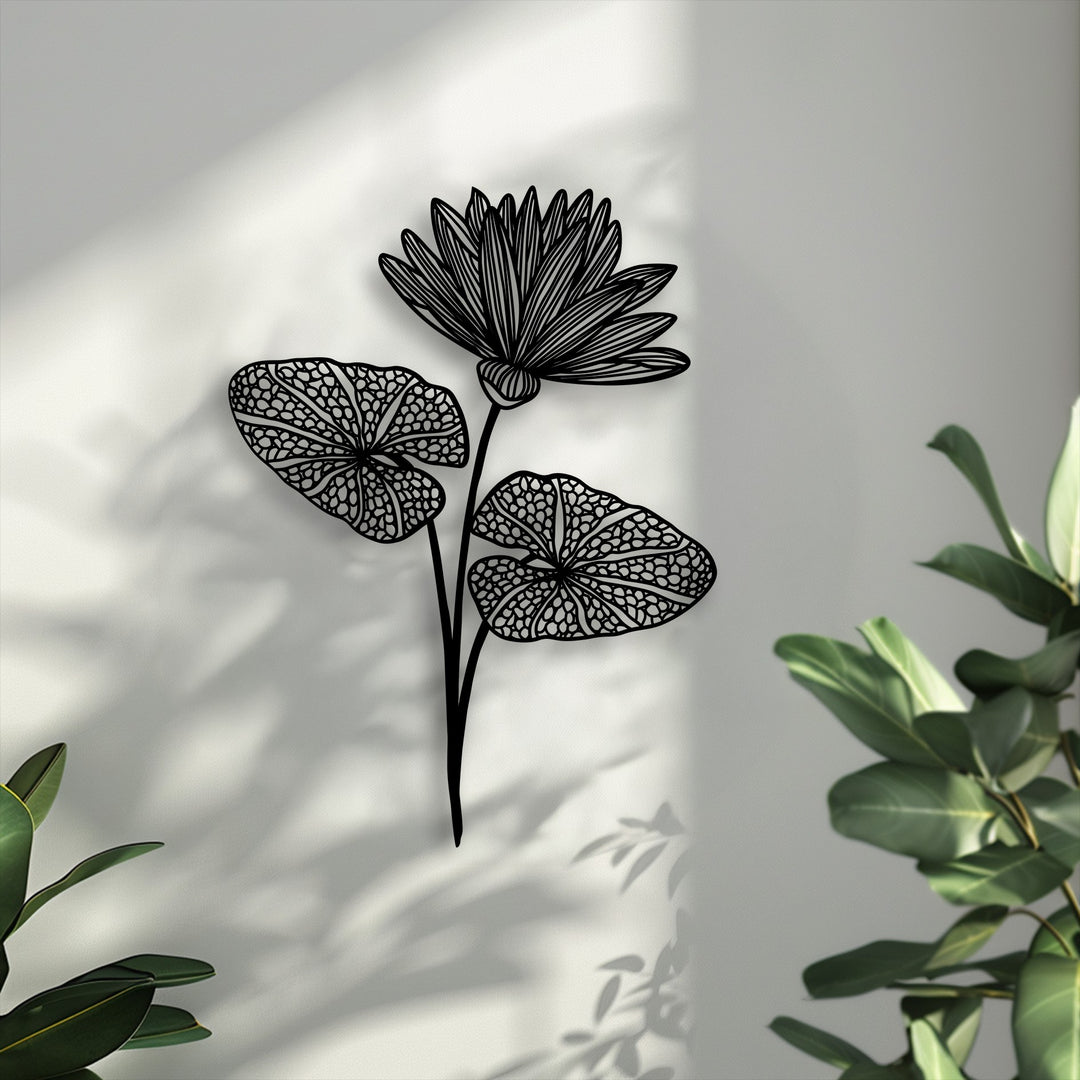 The sharp color contrast highlights the elegant black metal lotus bloom metal wall decor against the soft, bright wall and subtle shadows.