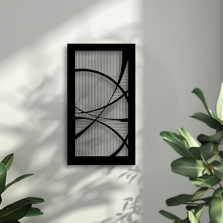 The sleek matte black finish of this geometric line harmony modern abstract metal decoration wall art beautifully contrasts its light metallic interior.