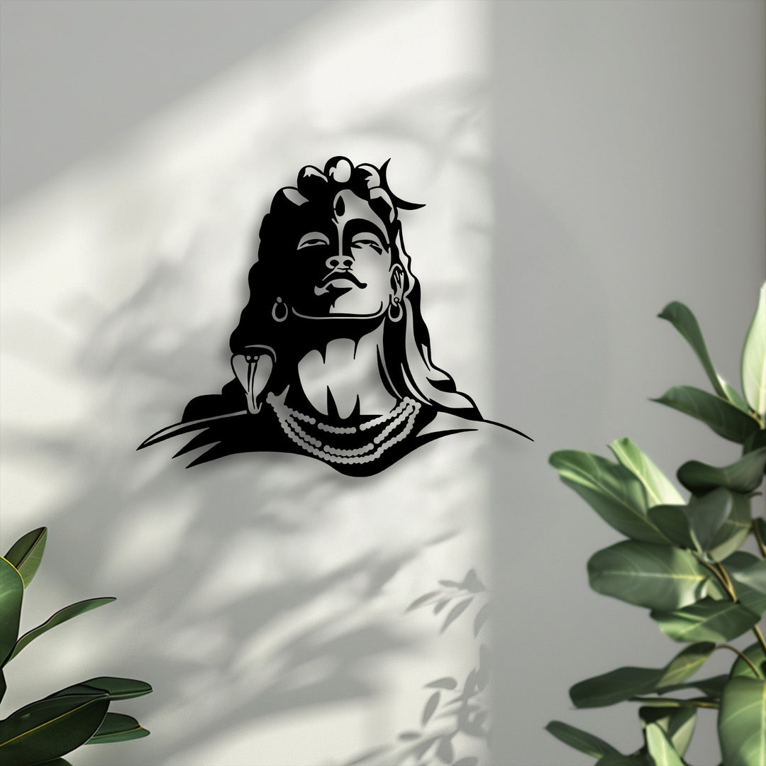 Focusing on the striking focal point, this Lord Shiva metal silhouette is an elegant spiritual decoration wall art against a sunlit wall.