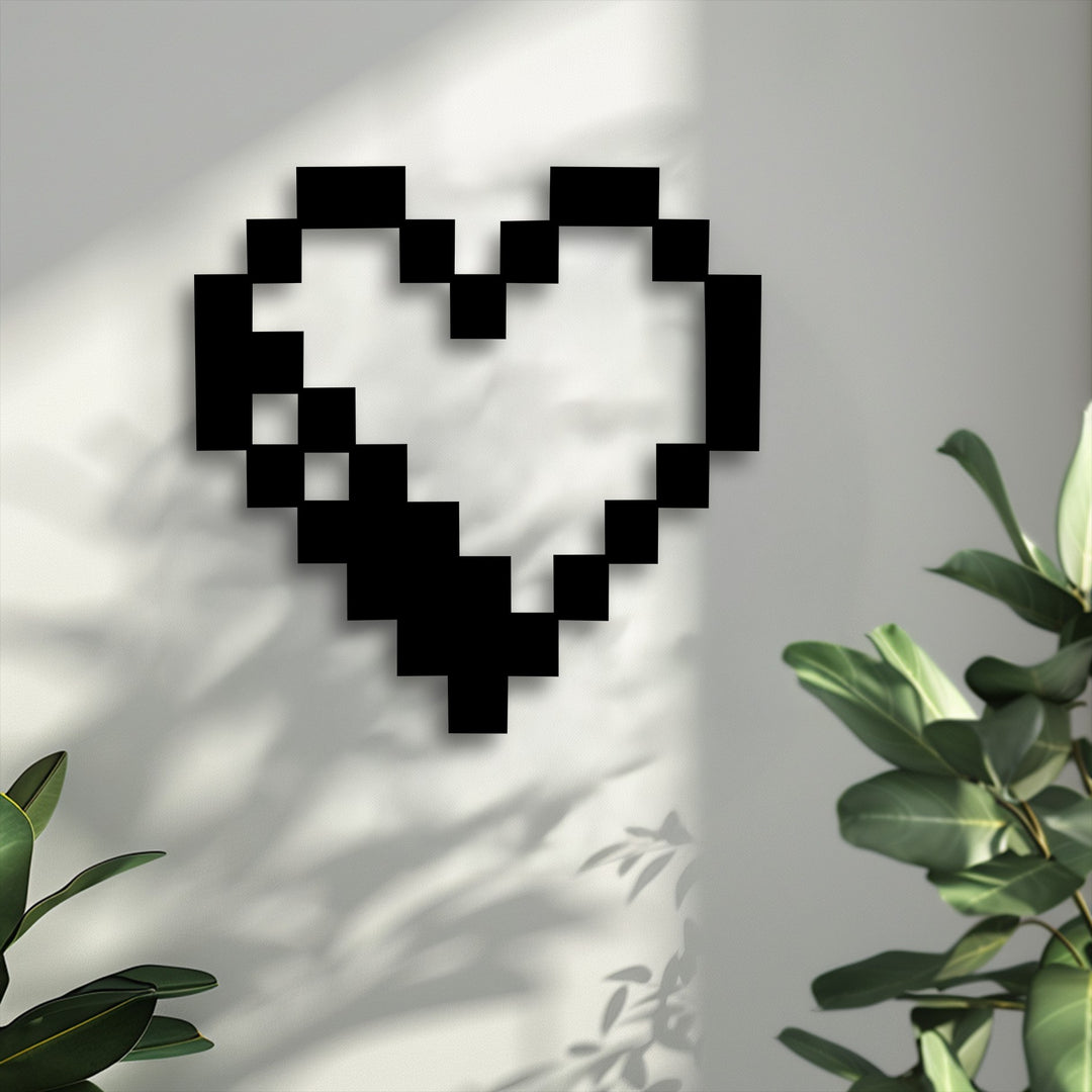 The abstract quality of this black pixelated heart icon, as decorative metal art, casts intricate shadows on the bright, textured wall.