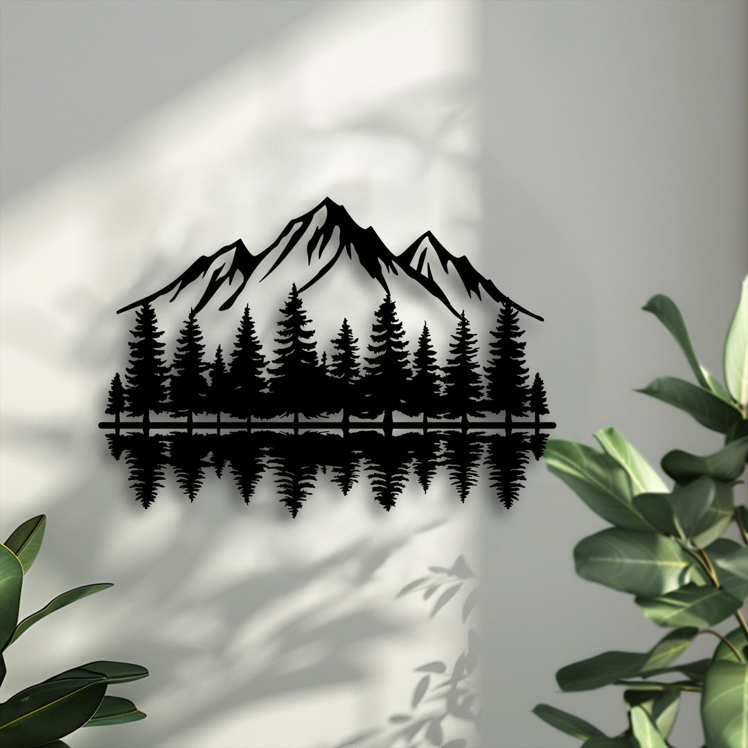 Displaying realistic detail, this striking metal wall decor features a symmetrical mountain forest reflection, an intricate nature landscape.