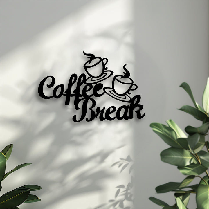 Sharp shadows from the coffee break script metal wall decor contrast with soft, dappled leaf shadows on the bright textured wall.