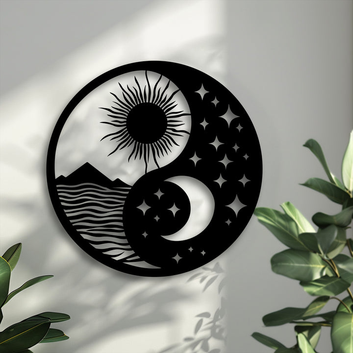 The intricate black metal Celestial Balance Yin Yang decoration wall art showcases a stylized sun, mountains, and moon with stars.