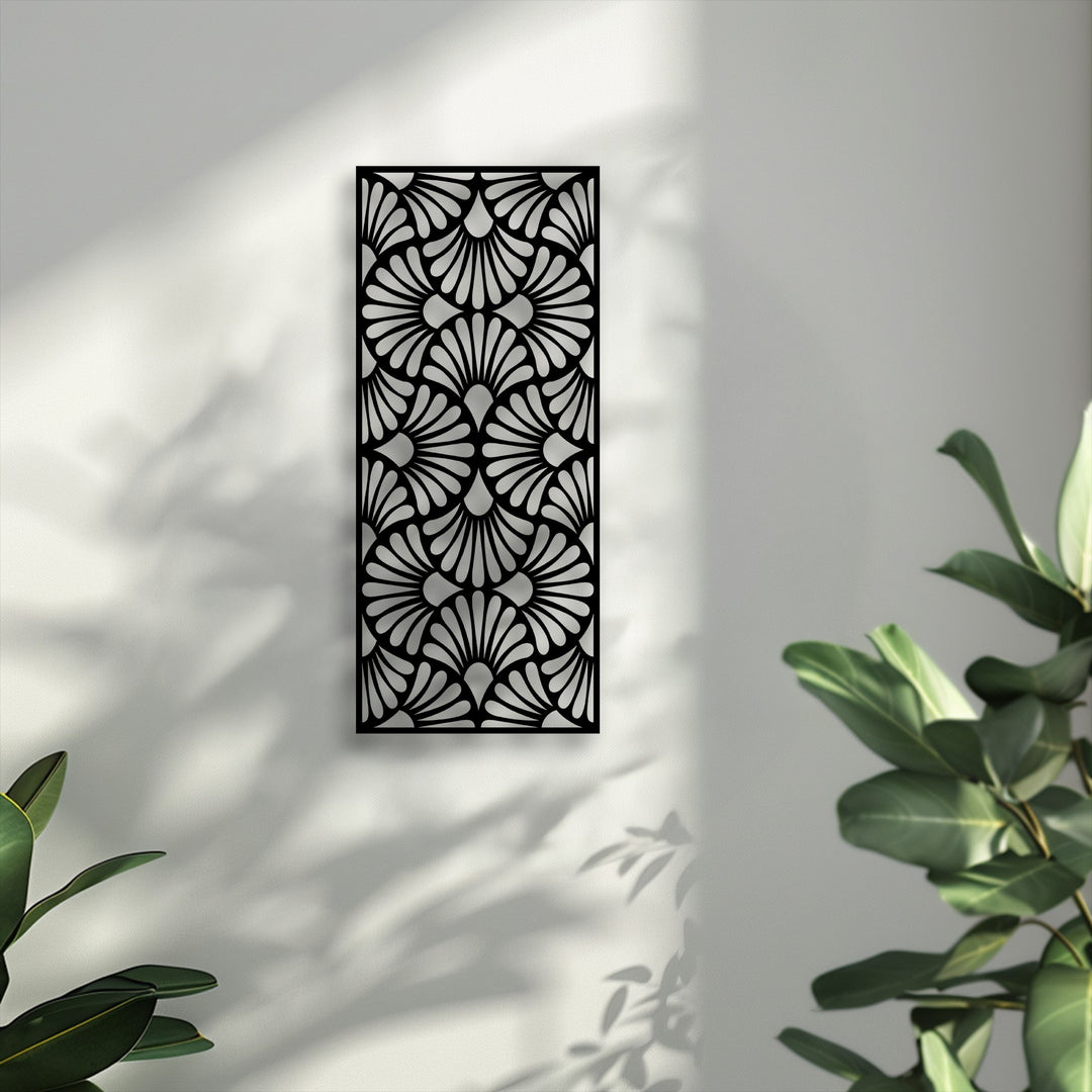 The Art Deco fan pattern metal art for wall casts dynamic shadows that dance, bringing a sense of movement to the bright, textured wall.