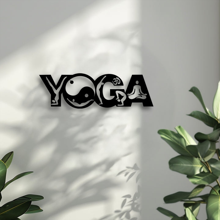 Black Yoga Balance Flow metal artwork featuring a yin yang symbol, Om, and meditation poses creatively integrated into the lettering.