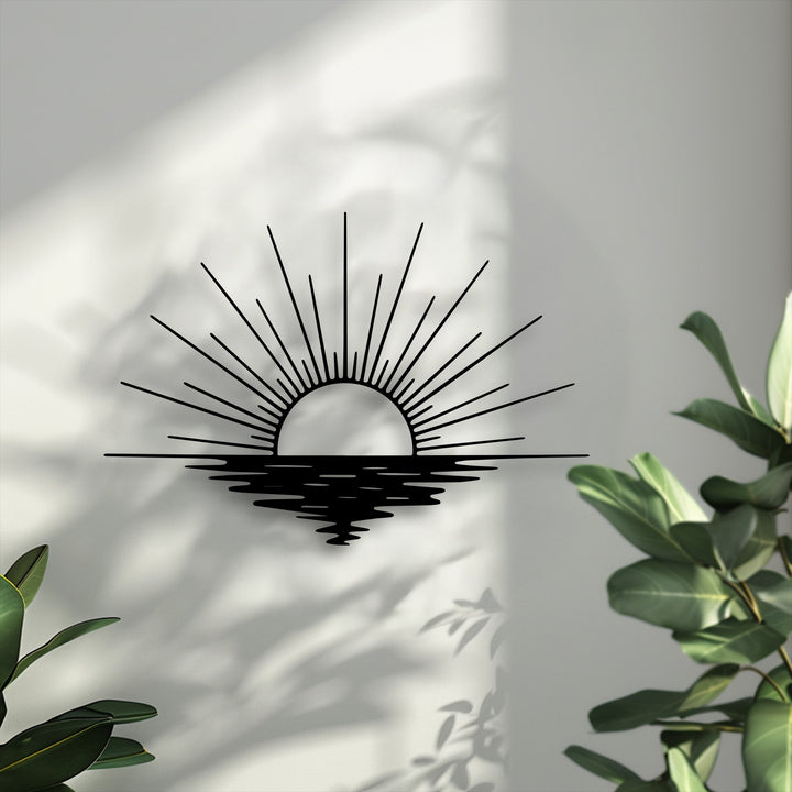 Organic forms of leaf shadows and a wavy ocean reflection define this sun rays metal wall art, creating captivating decoration wall art.