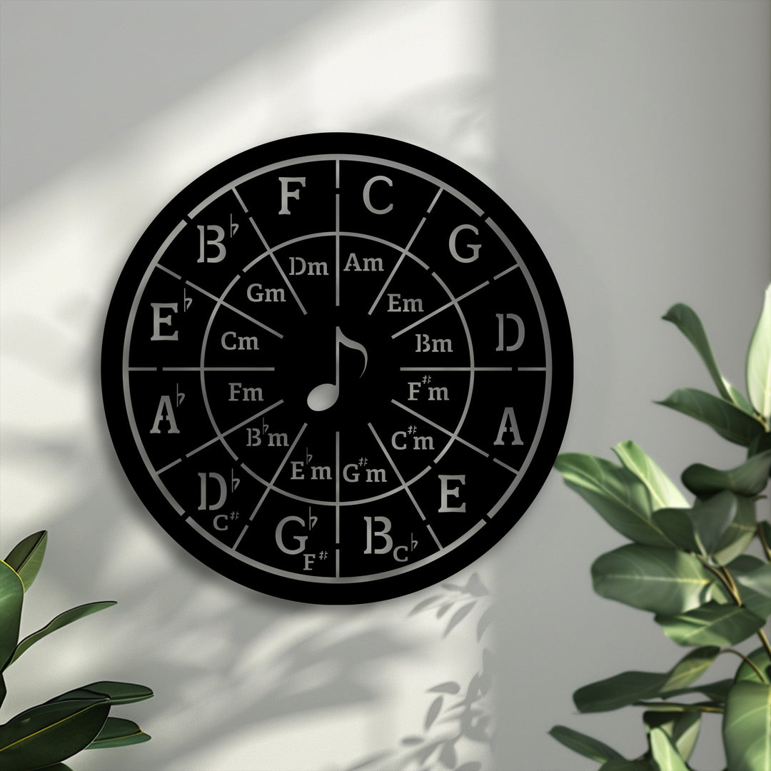 The smooth, matte black surface of this Circle of Fifths decorative metal art features precisely engraved silver music theory wall decor elements.
