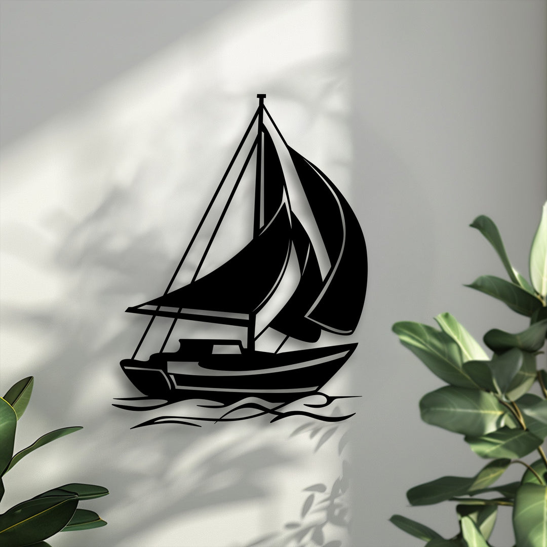 Low color saturation emphasizes the bold black sailing boat metal artwork, contrasted by a desaturated grey wall and muted green foliage.