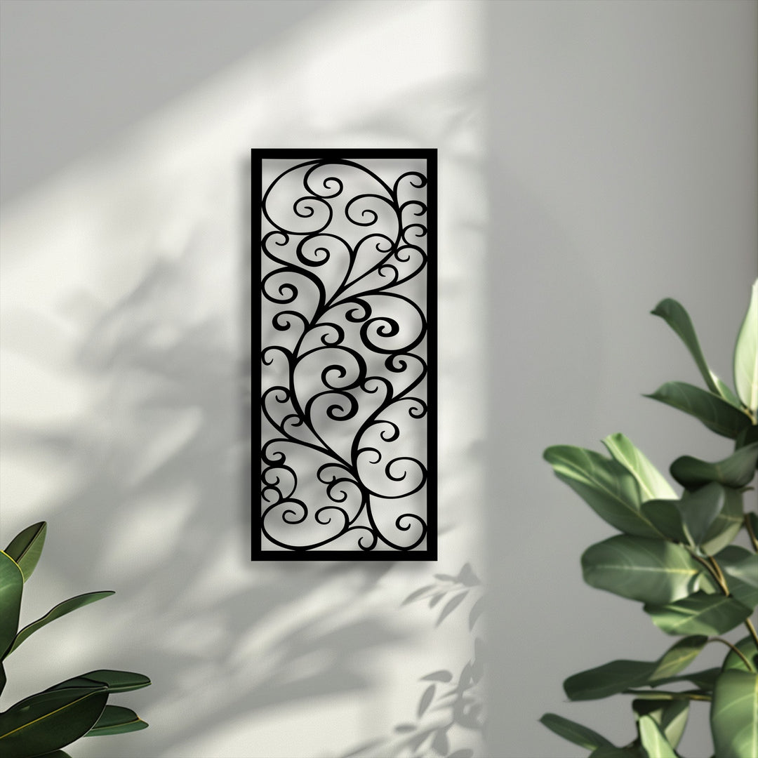 The prominent, deep green leaves of plants dominate the foreground, subtly framing the ornate scroll pattern metal art for wall.