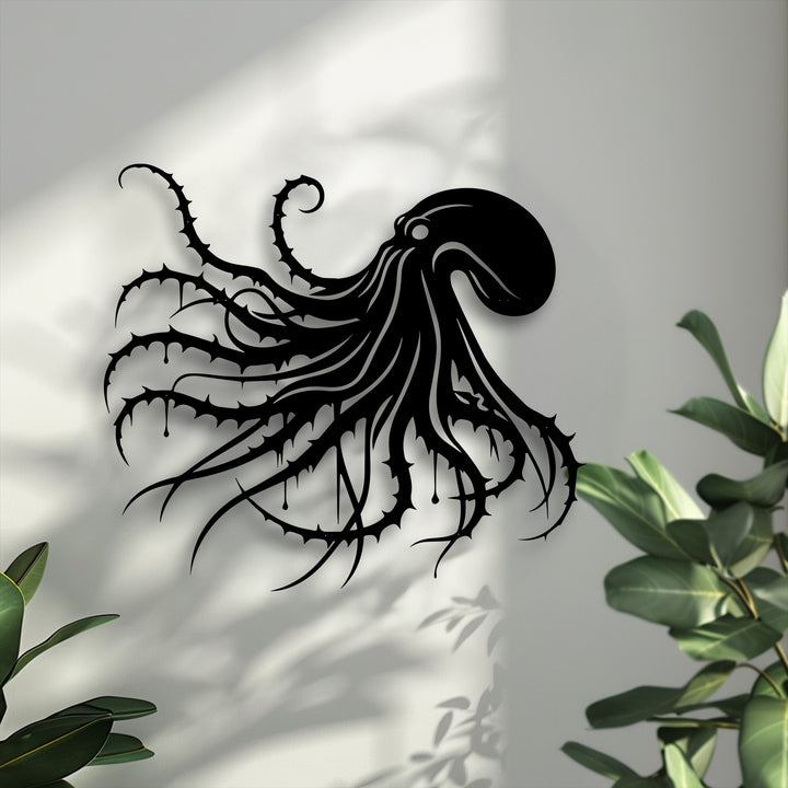 The deep, uniform matte black finish of this unique metal wall art elegantly defines the intricate dark octopus, perfect for gothic ocean decor.
