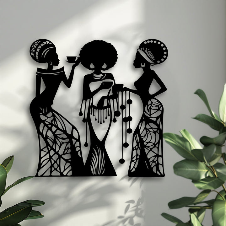 The stark color contrast accentuates the bold black silhouettes of three women against a bright wall, forming unique metal artwork.