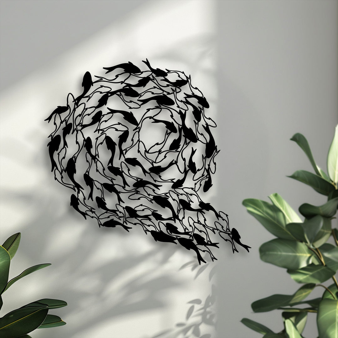 The visual rhythm of black koi fish decorative metal art, arranged in a swirling circle, creates dynamic flowing harmony on the light wall.