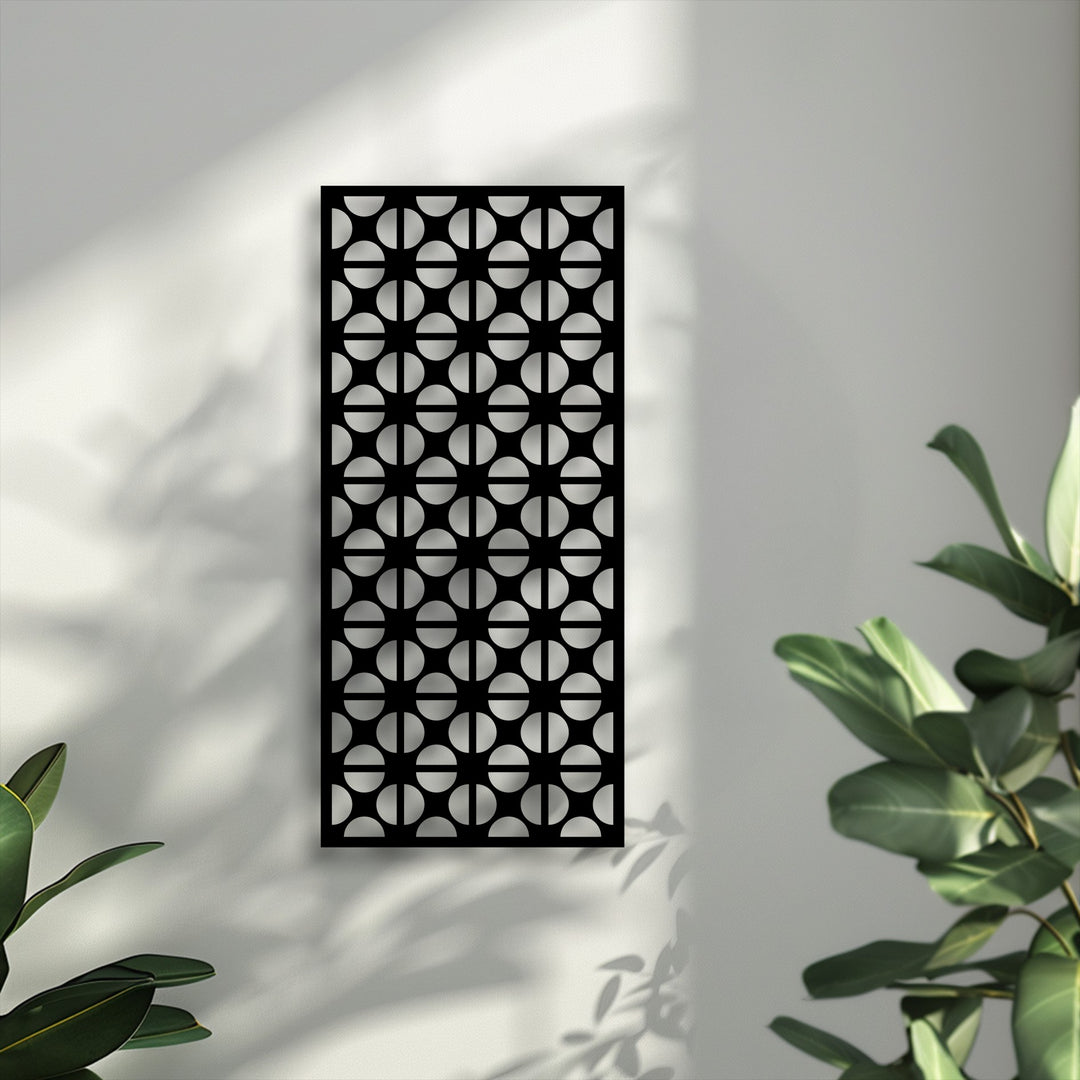Softly cast shadows dance on the wall, subtly highlighting the geometric circle pattern metal wall art, a sleek decoration wall art.