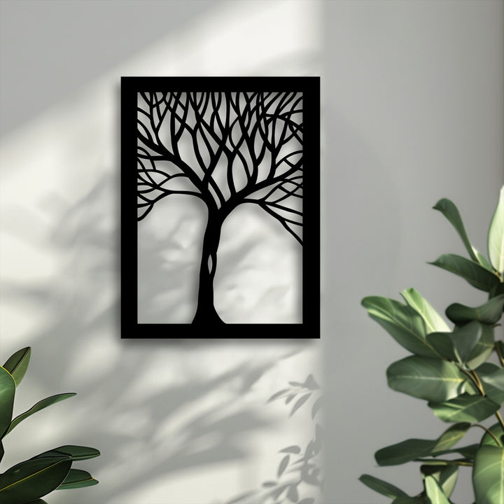 The crisp black frame defines the rectangular borders of this unique metal wall art, featuring an abstract tree silhouette.