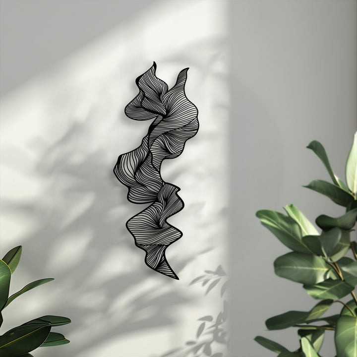 Visual rhythm is evident in the flowing lines of this black abstract metal wall art, making it unique decoration wall art.