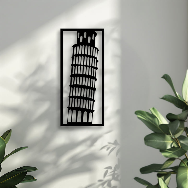 The Leaning Tower of Pisa metal artwork's iconic tilt conveys a sense of perpetual motion, enhanced by the shifting natural light and shadows.