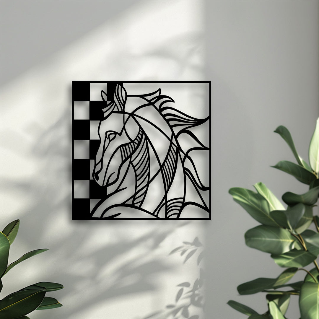 The foreground highlights an abstract black metal wall decor piece featuring a horse and chessboard, complemented by vibrant green foliage.