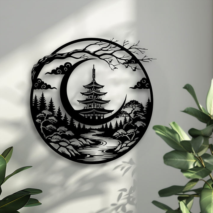 Centrally featured is a stylized Japanese pagoda within a crescent moon landscape, a serene and unique metal wall art decor.