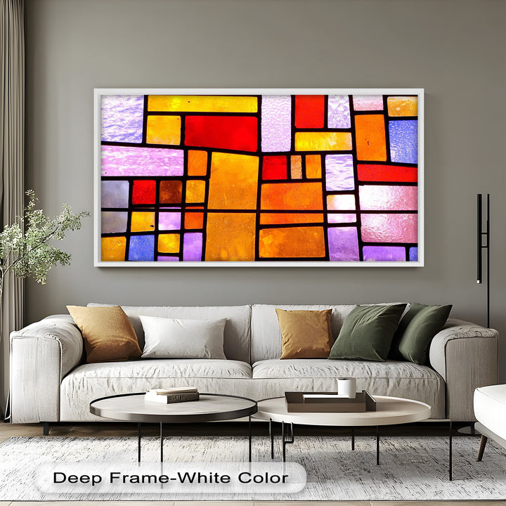 A richly colored wood artwork with overlapping panes of glowing red, purple, gold, and blue in a modern arrangement.