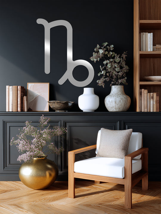 Stillness in the room is highlighted by the Capricorn zodiac symbol decoration wall art, a quiet accent against the wainscoting.