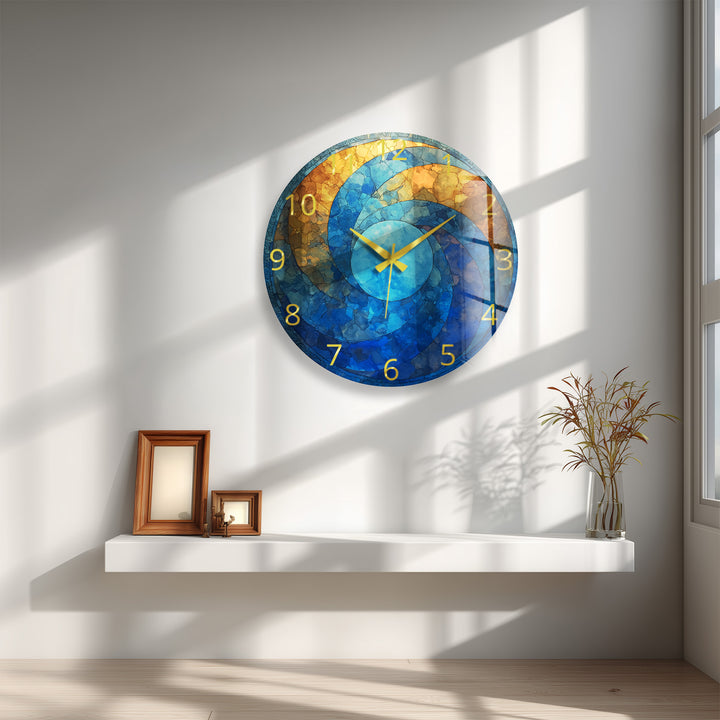 Blaue und goldene Glaswanduhr – abstraktes Kreisdekor