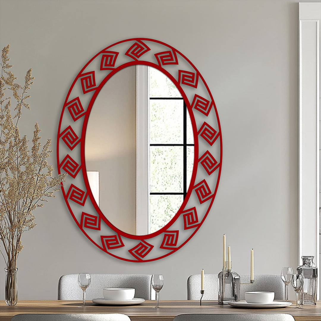 Flowing outward, the Greek key pattern around this modern oval floor mirror presents organic forms, enhancing this bathroom mirror's unique decorative style.