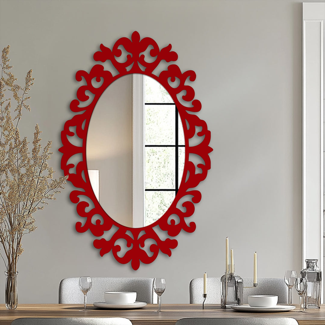 Light and shadow enhance the ornate curves of this red framed wall mirror, creating a visually striking Baroque motif with elegant reflections.