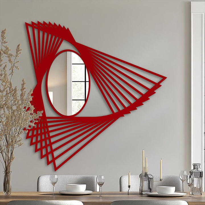 Framed by the angular motion lines, this modern geometric mirror's bold, red borders offer a striking example of decorative metal art.