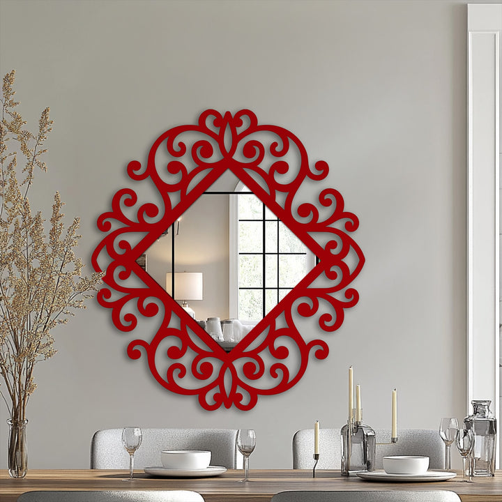 Foreground tableware complements the ornamental scroll diamond floor mirror, a beautiful example of decorating with wall mirrors and its classic baroque frame.