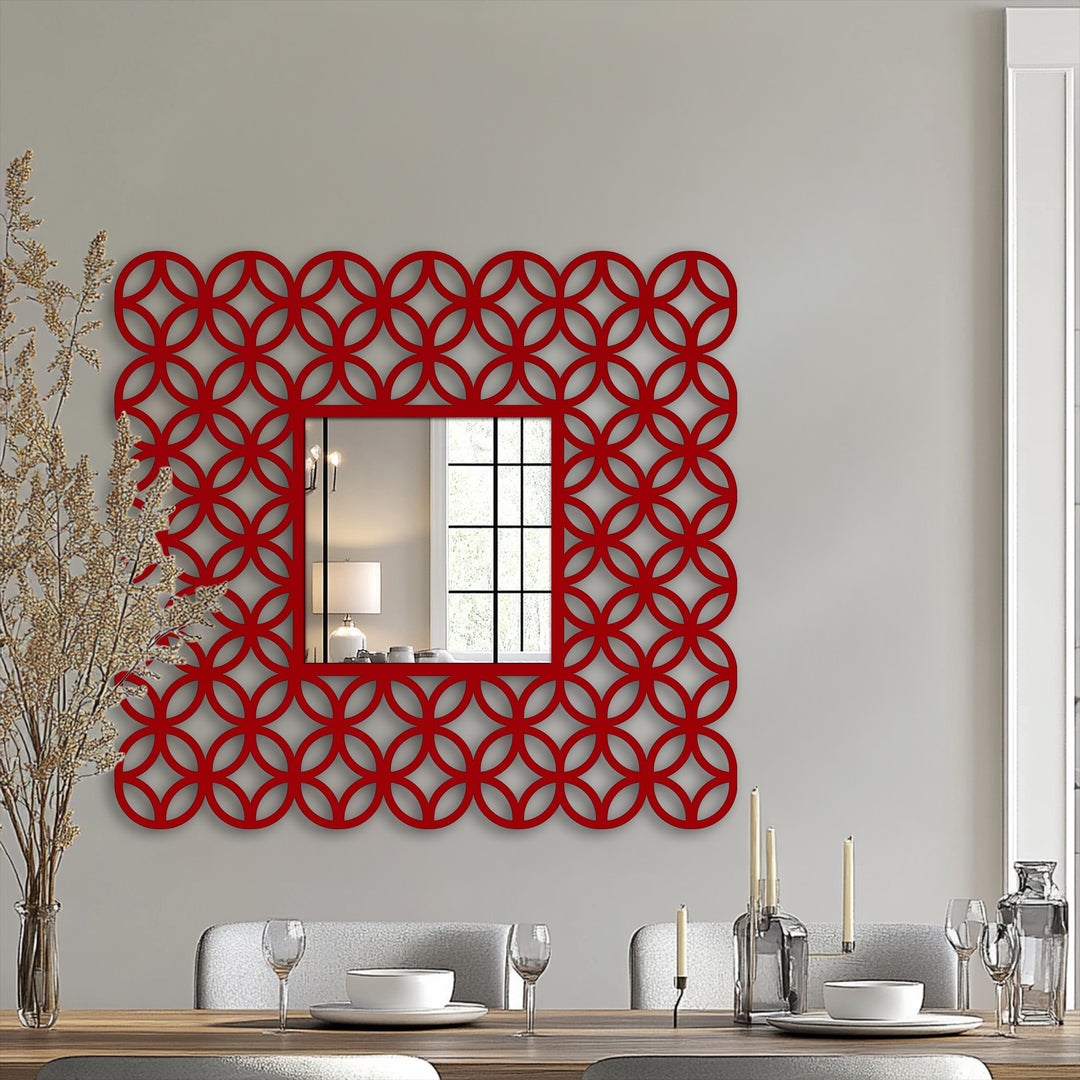 The darkest area highlights the depth of the interlocking ring pattern in this modern wall mirrors piece, framing a reflective square.