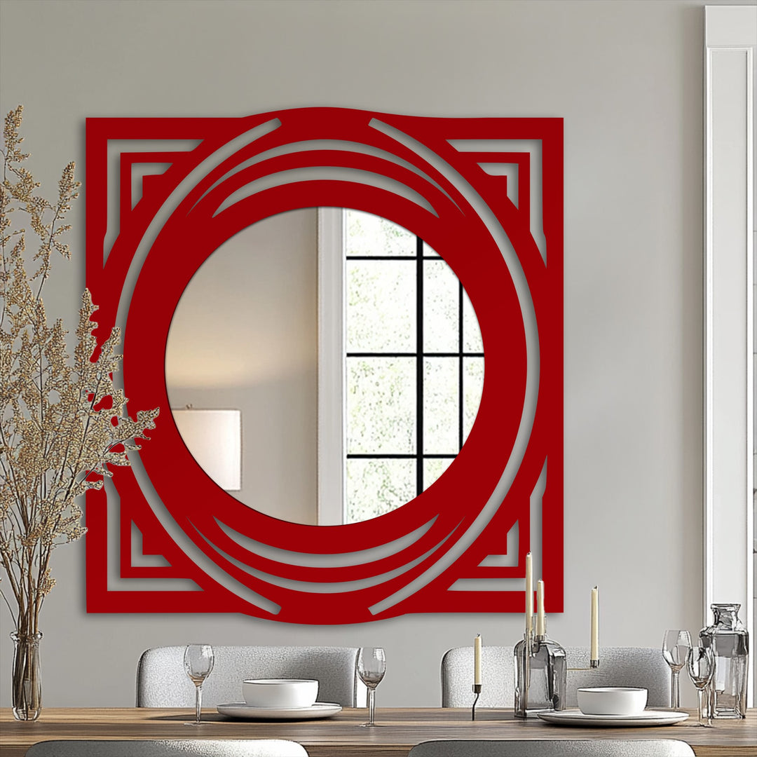 Captivating bathroom mirror showcases a red geometric frame with a central circular reflection, making it the focal point and adding a modern touch to the room.
