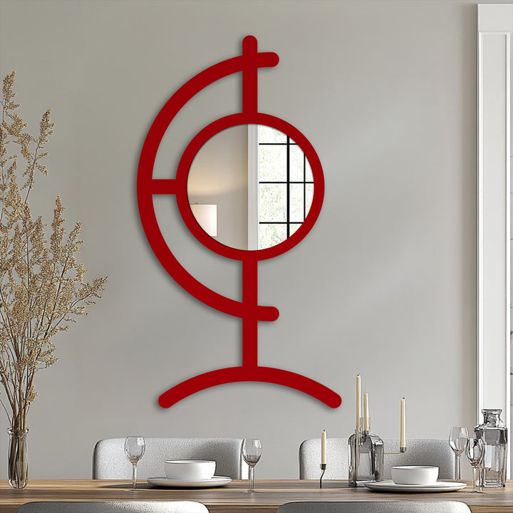 Emphasizing the layering effect, the Orbit Line floor mirror's bold red frame surrounds its round reflective surface in an eye-catching metal wall decor arrangement.