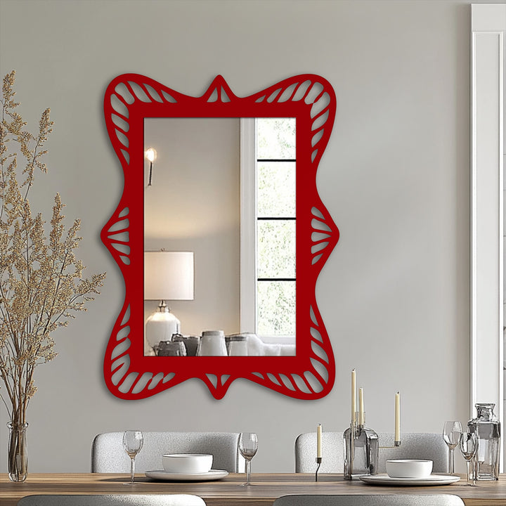 Reflecting depth and layers, the framed wall mirror creates dimension with an ornate, wave-like frame showcasing the multiple visual planes captured within.