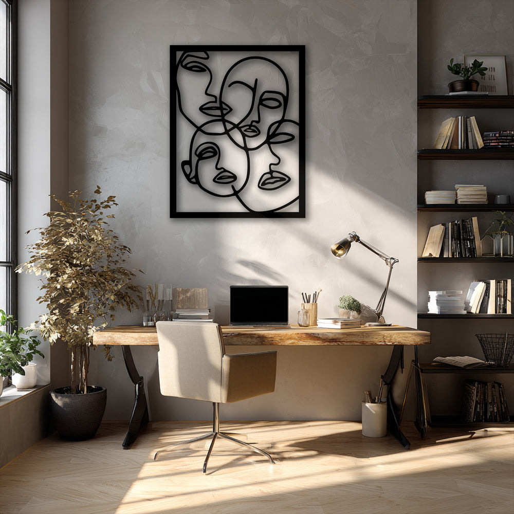 Bold geometric lines abstractly form five faces within the black rectangular metal frame, creating striking modern decoration wall art.