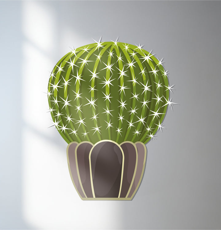 Showing the central subject, this desert-themed metal artwork depicts a prickly sphere cactus, perfect as minimalist wall decor.