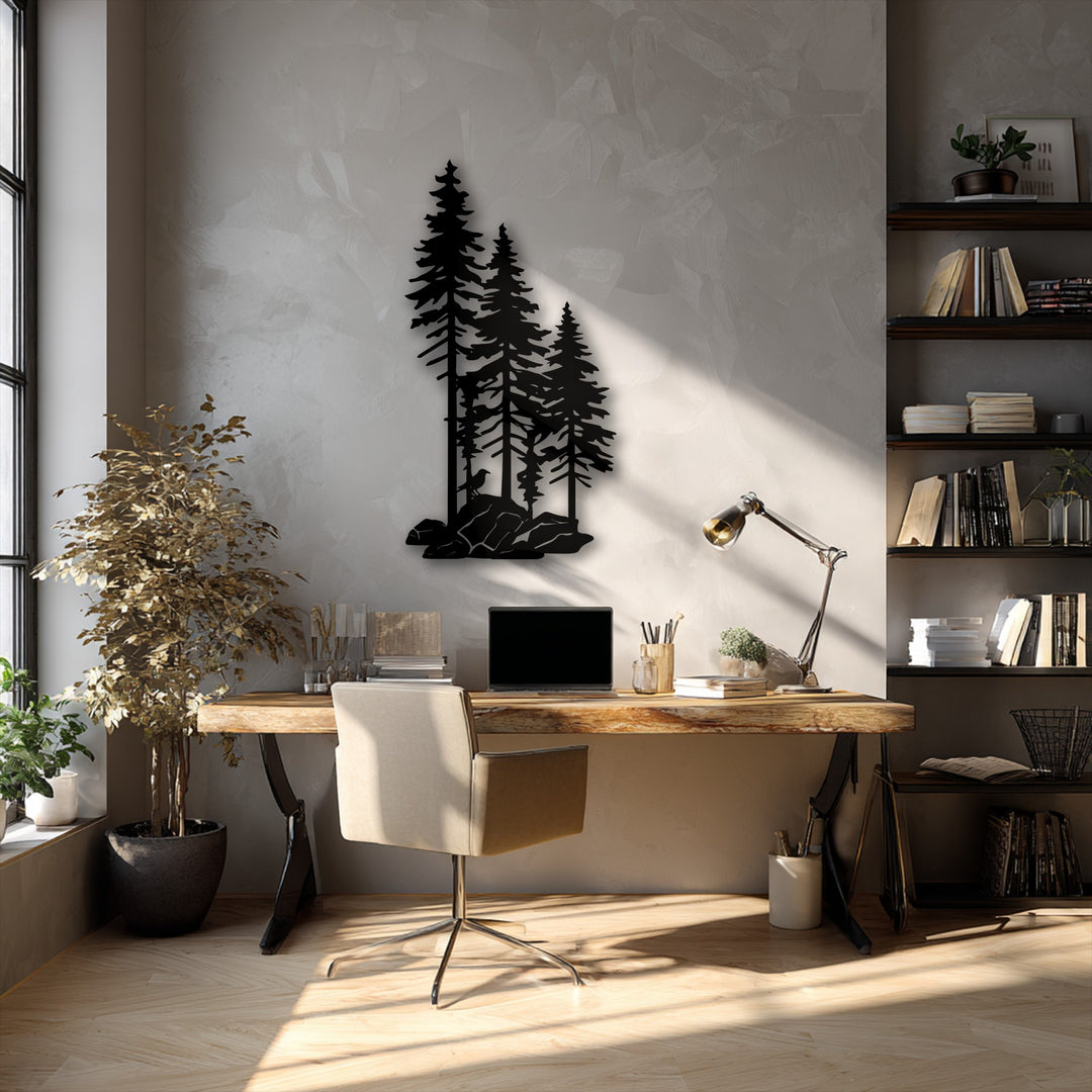 The image showcases low color saturation with muted tones highlighting the striking black pine trees metal wall decor above a rustic wooden desk.