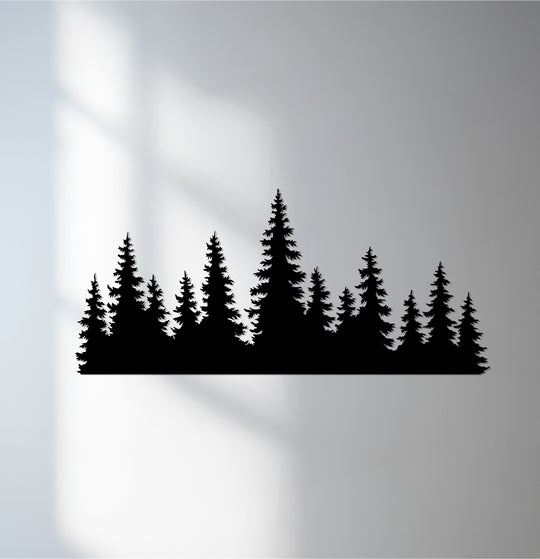 Low color saturation highlights the striking contrast in this pine forest silhouette, a piece of unique metal wall art showcasing rustic nature.
