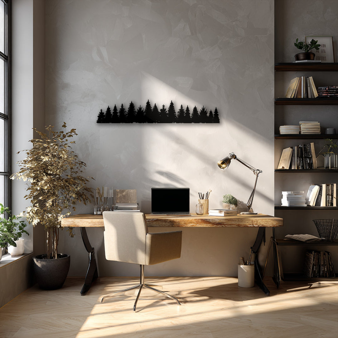 The darkest area reveals a striking pine forest silhouette decorative metal art piece centered on a subtly textured wall.